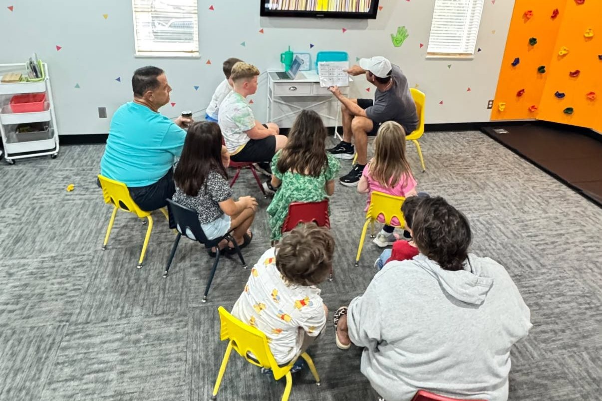 The Kingdom Kids room on a Sunday morning, with kids and leaders around the tables